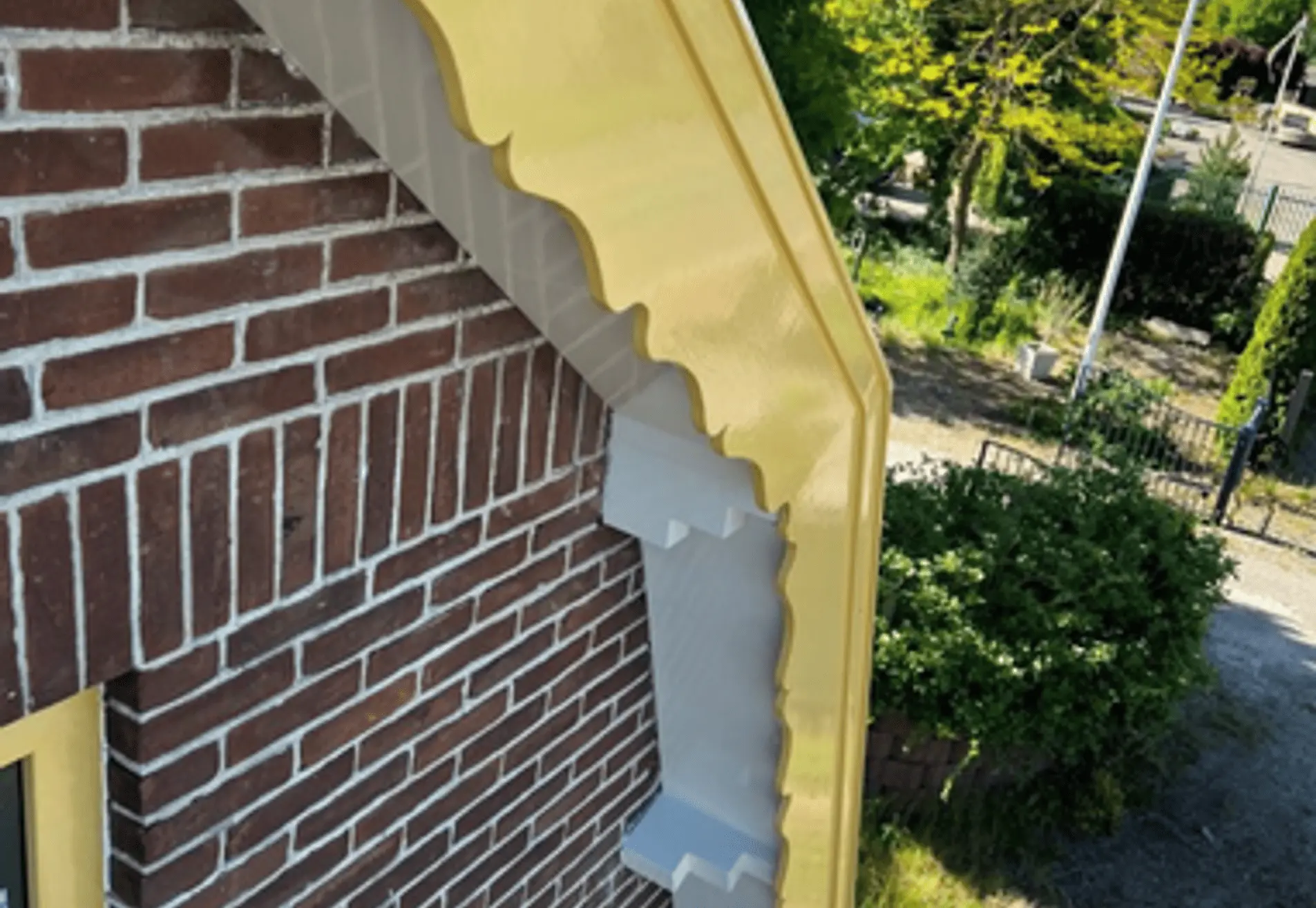 Buiten schilderwerk in Volendam