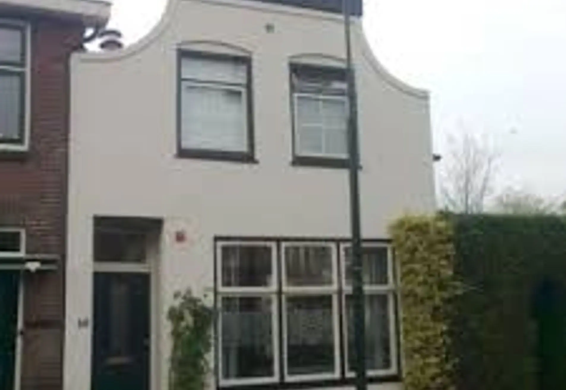 Schilderen van de kozijnen 